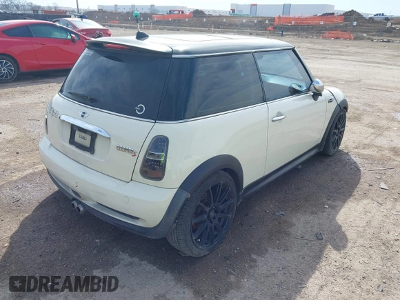 2006 MINI Hardtop S with VIN WMWRE335X6TL19914, listed as a IAAI auction lot 41680041 with 213,011 mi miles and . Bid and sale history available at DreamBid. Image 4.