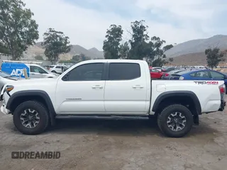 2023 Toyota Tacoma SR with VIN 3TMCZ5AN1PM556299, listed as a IAAI auction lot 42344160 with 42,338 mi miles and . Bid and sale history available at DreamBid. Image 15.