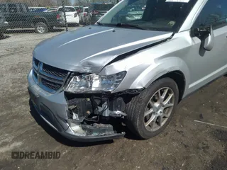 2011 Dodge Journey Mainstreet with VIN 3D4PG1FG5BT540585, listed as a IAAI auction lot 41852964 with 156,941 mi miles and . Bid and sale history available at carsss.com. Image 6.