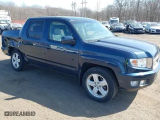 2011 Honda Ridgeline RTL with VIN 5FPYK1F51BB011686, listed as a IAAI auction lot 41790303 with 110,648 mi miles. Bid and sale history available at carsss.com. Image 1.