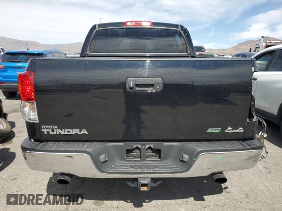 2013 Toyota Tundra with VIN 5TFDW5F17DX307031, listed as a Copart auction lot 49740825 with 113,917 mi miles and Salvage title. Bid and sale history available at DreamBid. Image 6.