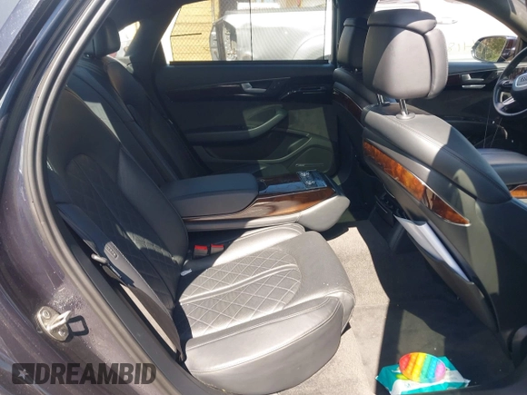 2016 Audi A8 L 4.0T Sport with VIN WAU43AFD1GN022253, listed as a IAAI auction lot 41858053 with 219,517 mi miles. Bid and sale history available at carsss.com. Image 8.