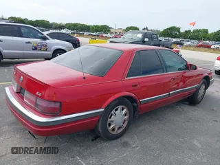 1995 Cadillac Seville Luxury SLS with VIN 1G6KS52Y7SU833943, listed as a IAAI auction lot 40873559 with 1 mi miles. Bid and sale history available at carsss.com. Image 6.