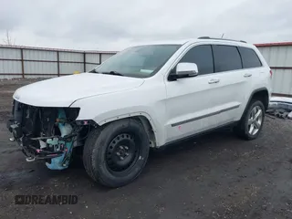 2013 Jeep Grand Cherokee Overland with VIN 1C4RJFCT4DC640553, listed as a IAAI auction lot 41311413 with 146,212 mi miles. Bid and sale history available at carsss.com. Image 20.