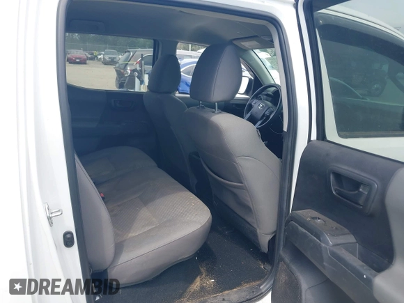 2022 Toyota Tacoma SR with VIN 3TYCZ5AN9NT098903, listed as a IAAI auction lot 42088505 with 93,000 mi miles and . Bid and sale history available at DreamBid. Image 8.