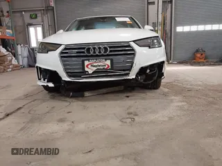 2019 Audi A4 Premium with VIN WAUDNAF47KA117328, listed as a IAAI auction lot 41634062 with 126,067 mi miles and . Bid and sale history available at DreamBid. Image 6.