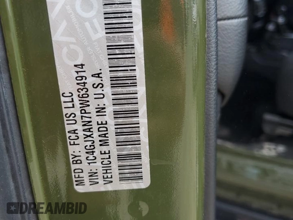 2023 Jeep Wrangler Sport S with VIN 1C4GJXAN7PW634914, listed as a Copart auction lot 63533355 with 39,490 mi miles and Salvage title. Bid and sale history available at DreamBid. Image 12.
