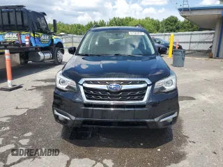 2017 Subaru Forester Touring z VIN JF2SJAWCXHH431232, wystawiony jako Copart lot #61625265 z przebiegiem 67 280 mil mil oraz Szkoda całkowita • Salvage title. Historia ofert i sprzedaży dostępna na DreamBid. Obrazek 5.