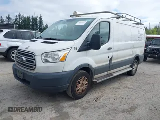 2015 Ford Transit Cargo with VIN 1FTNR1ZM6FKA34609, listed as a IAAI auction lot 42635875 with 214,750 mi miles and . Bid and sale history available at DreamBid. Image 2.