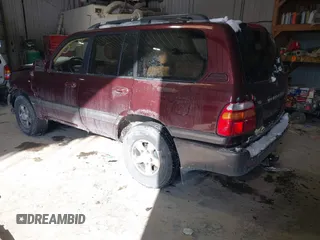 2000 Toyota Land Cruiser with VIN JT3HT05J2Y0102508, listed as a IAAI auction lot 41596418 with 271,327 mi miles. Bid and sale history available at carsss.com. Image 3.