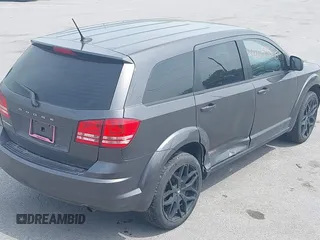 2015 Dodge Journey SE z VIN 3C4PDCAB4FT675074, wystawiony jako IAAI lot #42059878 z przebiegiem 99 947 mil mil oraz . Historia ofert i sprzedaży dostępna na DreamBid. Obrazek 14.