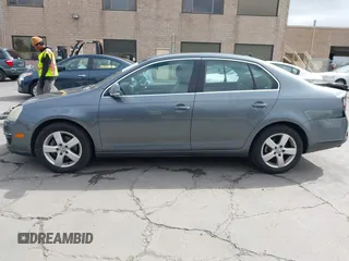 2009 Volkswagen Jetta Sedan SE with VIN 3VWRZ71K49M084983, listed as a IAAI auction lot 42095707 with 154,691 mi miles. Bid and sale history available at carsss.com. Image 14.