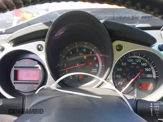 2014 Nissan 370Z Touring with VIN JN1AZ4FH8EM620208, listed as a IAAI auction lot 42094292 with 68,799 mi miles and . Bid and sale history available at DreamBid. Image 7.