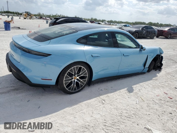 2024 Porsche Taycan z VIN WP0AA2Y17RSA10720, wystawiony jako Copart lot #50988475 z przebiegiem 2 836 mil mil oraz Szkoda całkowita • Salvage title. Historia ofert i sprzedaży dostępna na DreamBid. Obrazek 3.