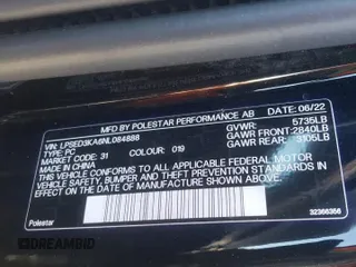 2022 Polestar 2 z VIN LPSED3KA6NL084888, wystawiony jako Copart lot #88759795 z przebiegiem 32 878 mil mil oraz Szkody całkowita. Historia ofert i sprzedaży dostępna na DreamBid. Obrazek 14.