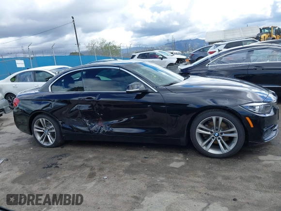 2018 BMW 4 Series 430i z VIN WBA4Z1C55JEC59897, wystawiony jako IAAI lot #41774609 z przebiegiem 80 017 mil mil oraz . Historia ofert i sprzedaży dostępna na DreamBid. Obrazek 13.