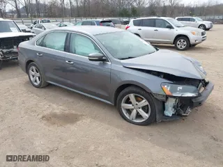 2014 Volkswagen Passat SE w/Sunroof with VIN 1VWBT7A38EC061391, listed as a IAAI auction lot 41763992 with 134,974 mi miles. Bid and sale history available at carsss.com. Image 1.