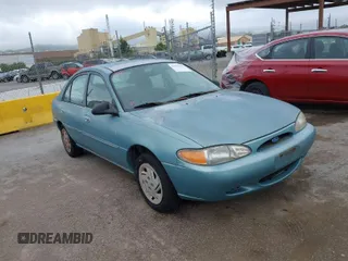 1997 Ford Escort LX with VIN 1FALP13P2VW120285, listed as a IAAI auction lot 42062142 with 199,076 mi miles. Bid and sale history available at carsss.com. Image 1.