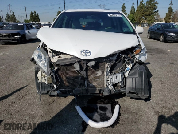 2013 Toyota Sienna XLE AAS with VIN 5TDYK3DC5DS322039, listed as a Copart auction lot 61657715 with 185,269 mi miles and Salvage title. Bid and sale history available at DreamBid. Image 5.