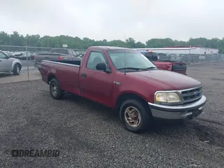 1997 Ford F-150 z VIN 1FTDF176XVNB00018, wystawiony jako IAAI lot #42467851 z przebiegiem 217 082 mil mil oraz . Historia ofert i sprzedaży dostępna na DreamBid. Obrazek 1.