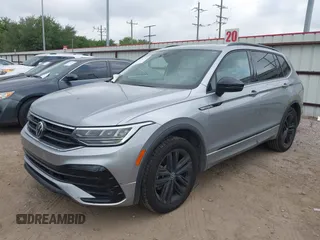 2022 Volkswagen Tiguan SE R-Line Black with VIN 3VVCB7AXXNM165748, listed as a IAAI auction lot 42178772 with 64,007 mi miles and . Bid and sale history available at DreamBid. Image 17.