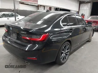 2020 BMW 3 Series 330i xDrive with VIN 3MW5R7J09L8B07302, listed as a IAAI auction lot 42592023 with 60,724 mi miles and . Bid and sale history available at DreamBid. Image 4.