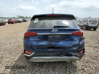 2019 Hyundai Santa Fe SE z VIN 5NMS2CAD4KH125270, wystawiony jako Copart lot #57273265 z przebiegiem 49 685 mil mil oraz Szkoda całkowita • Salvage title. Historia ofert i sprzedaży dostępna na DreamBid. Obrazek 6.