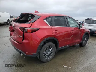 2021 Mazda CX-5 Touring with VIN JM3KFACM8M0406987, listed as a Copart auction lot 45241535 with 57,673 mi miles and Salvage Title. Bid and sale history available at carsss.com. Image 3.