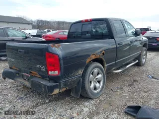 2003 Dodge Ram 1500 ST with VIN 1D7HU18D23S340883, listed as a IAAI auction lot 41622821 with 232,271 mi miles. Bid and sale history available at carsss.com. Image 4.