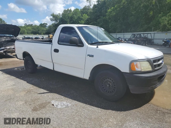 1997 Ford F-150 with VIN 1FTDF1721VND40734, listed as a Copart auction lot 62172315 with 158,102 mi miles and Salvage title. Bid and sale history available at DreamBid. Image 4.
