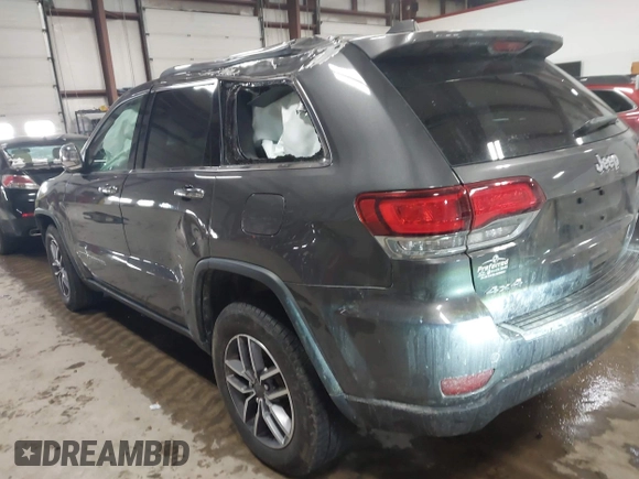 2021 Jeep Grand Cherokee 80th Anniversary with VIN 1C4RJFBG7MC513588, listed as a IAAI auction lot 41441227 with 49,143 mi miles and . Bid and sale history available at DreamBid. Image 3.