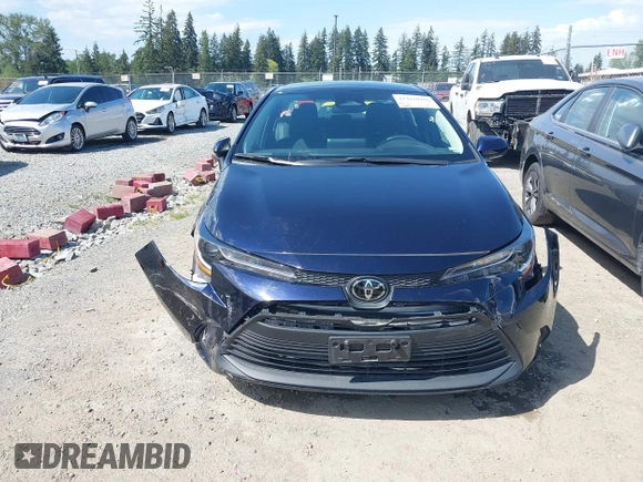 2023 Toyota Corolla LE with VIN 5YFB4MDE2PP052532, listed as a IAAI auction lot 42169698 with 32,622 mi miles. Bid and sale history available at carsss.com. Image 12.