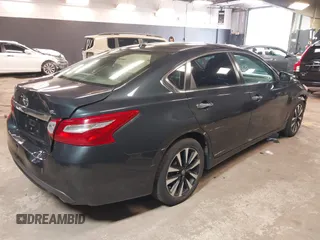 2018 Nissan Altima SR with VIN 1N4AL3AP2JC142302, listed as a IAAI auction lot 42013171 with 112,360 mi miles and . Bid and sale history available at carsss.com. Image 4.