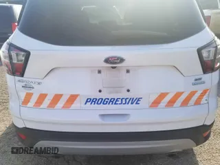 2017 Ford Escape SE z VIN 1FMCU0GD4HUC98854, wystawiony jako IAAI lot #42558269 z przebiegiem 62 975 mil mil oraz . Historia ofert i sprzedaży dostępna na DreamBid. Obrazek 20.
