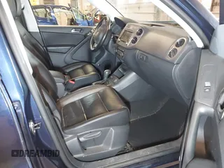 2011 Volkswagen Tiguan SE with VIN WVGBV7AXXBW533872, listed as a IAAI auction lot 40197835 with 104,685 mi miles and . Bid and sale history available at DreamBid. Image 5.