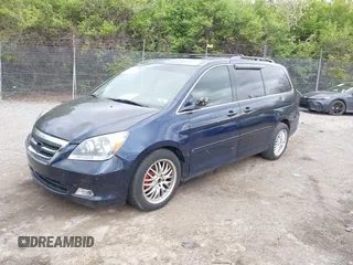 2007 Honda Odyssey EX-L with VIN 5FNRL38737B031255, listed as a IAAI auction lot 42040035 with 233,369 mi miles. Bid and sale history available at carsss.com. Image 2.