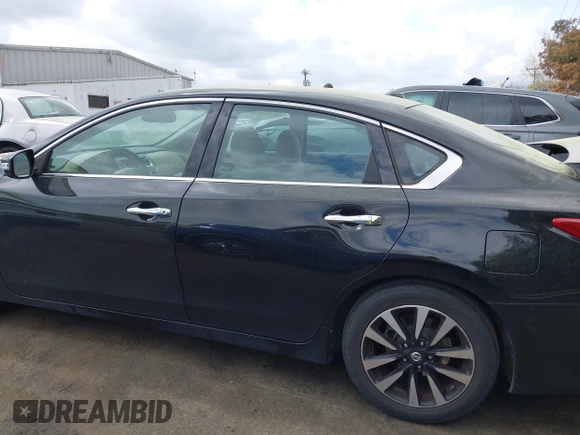 2018 Nissan Altima S with VIN 1N4AL3AP3JC195154, listed as a IAAI auction lot 41879582 with 160,162 mi miles and . Bid and sale history available at DreamBid. Image 14.