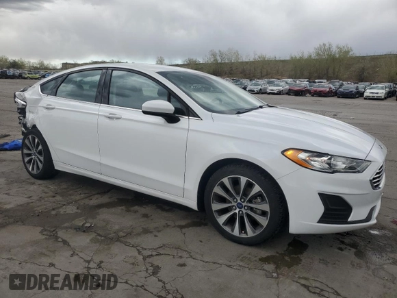 2020 Ford Fusion SE z VIN 3FA6P0T9XLR138977, wystawiony jako Copart lot #55260085 z przebiegiem 92 470 mil mil oraz Szkoda całkowita • Salvage title. Historia ofert i sprzedaży dostępna na DreamBid. Obrazek 4.