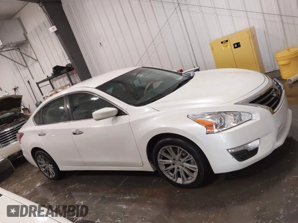 2015 Nissan Altima S with VIN 1N4AL3AP1FC169711, listed as a IAAI auction lot 41884037 with 129,228 mi miles and . Bid and sale history available at DreamBid. Image 14.