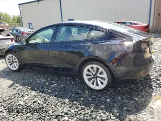 2022 Tesla Model 3 z VIN 5YJ3E1EA7NF185338, wystawiony jako Copart lot #57221875 z przebiegiem 134 215 mil mil oraz Szkoda całkowita • Salvage title. Historia ofert i sprzedaży dostępna na DreamBid. Obrazek 2.