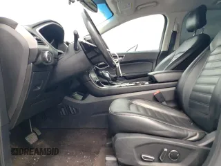 2016 Ford Edge SEL z VIN 2FMPK4J94GBB25424, wystawiony jako Copart lot #57108405 z przebiegiem 130 397 mil mil oraz Szkoda całkowita • Salvage title. Historia ofert i sprzedaży dostępna na DreamBid. Obrazek 7.