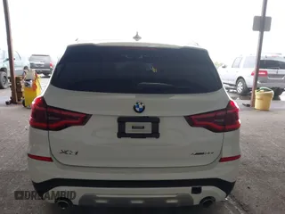 2021 BMW X3 xDrive30i with VIN 5UXTY5C03M9F57938, listed as a IAAI auction lot 41093987 with 102,557 mi miles and . Bid and sale history available at DreamBid. Image 16.
