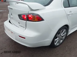 2015 Mitsubishi Lancer GT with VIN JA32U8FW5FU008618, listed as a IAAI auction lot 41290204 with 115,854 mi miles. Bid and sale history available at carsss.com. Image 18.
