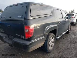 2011 Honda Ridgeline RTL with VIN 5FPYK1F5XBB454788, listed as a IAAI auction lot 41501881 with 171,481 mi miles. Bid and sale history available at carsss.com. Image 4.