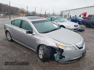 2009 Acura TL Tech with VIN 19UUA86569A020715, listed as a IAAI auction lot 41521211 with 179,977 mi miles. Bid and sale history available at carsss.com. Image 1.