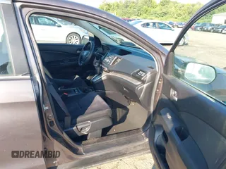2013 Honda CR-V LX with VIN 3CZRM3H31DG703436, listed as a IAAI auction lot 42702584 with 140,013 mi miles and . Bid and sale history available at DreamBid. Image 5.