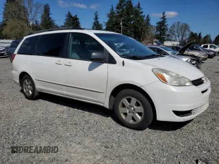 2004 Toyota Sienna CE with VIN 5TDZA23C24S049001, listed as a Copart auction lot 54015845 with 214,749 mi miles and Salvage Title. Bid and sale history available at carsss.com. Image 4.