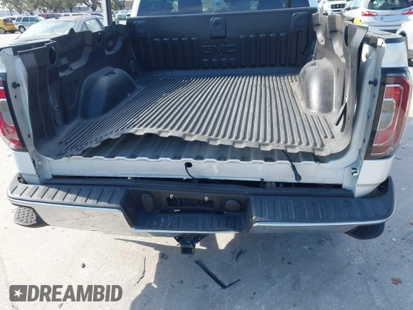 2017 GMC Sierra 1500 SLT with VIN 3GTP1NECXHG423591, listed as a IAAI auction lot 41509177 with 100,071 mi miles and . Bid and sale history available at DreamBid. Image 6.