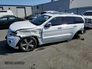 2015 Jeep Grand Cherokee High Altitude with VIN 1C4RJFCM2FC215232, listed as a Copart auction lot 60002875 with 122,813 mi miles and Salvage title. Bid and sale history available at DreamBid. Image 1.