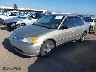 2003 Honda Civic LX with VIN 2HGES16563H521654, listed as a IAAI auction lot 42094679 with 157,031 mi miles. Bid and sale history available at carsss.com. Image 2.